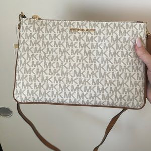 One is white, brown, tan and the other is light pink